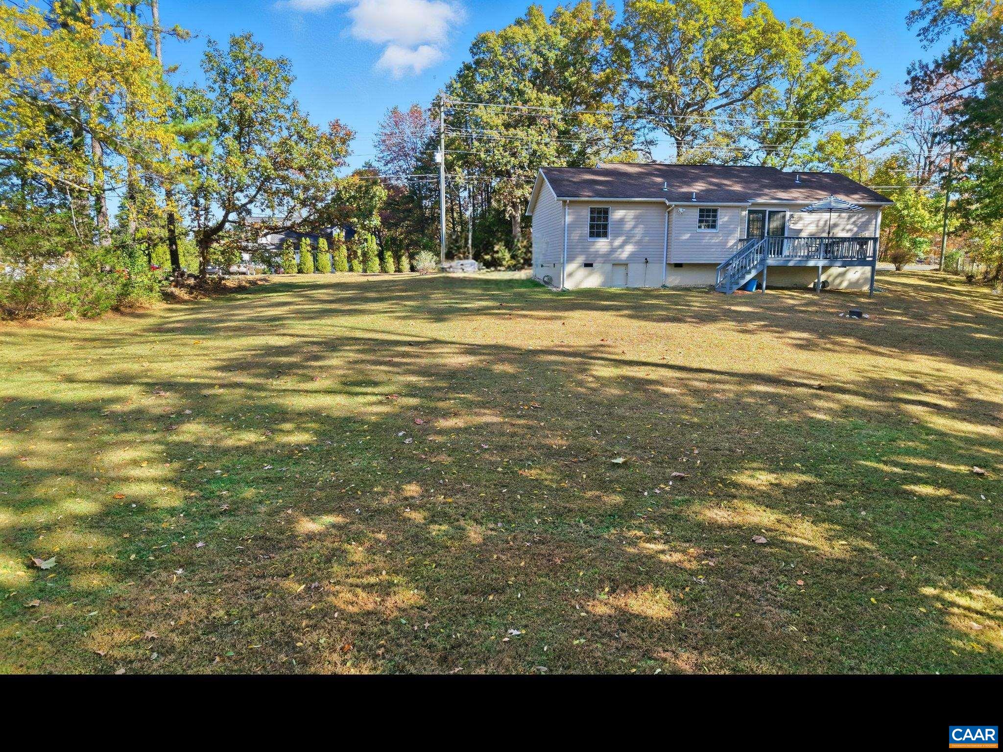 5356 Amicus Road Ruckersville, VA 22968 - Photo 43 of 46 a view of a house with a swimming pool
