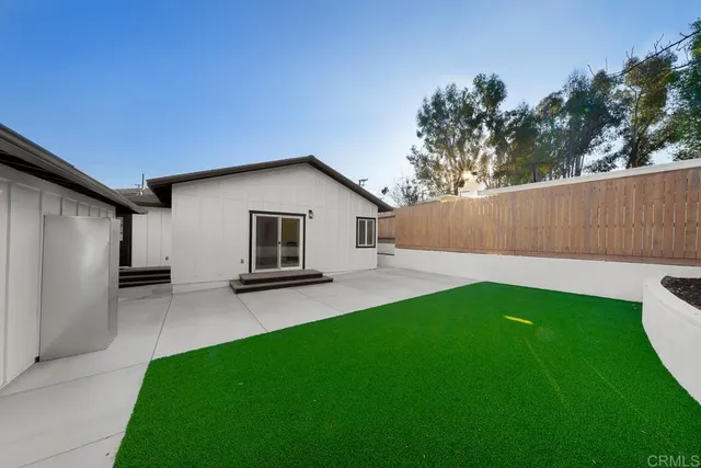 a view of a backyard with a garden