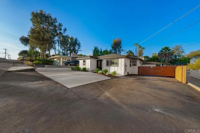a view of a house with a street