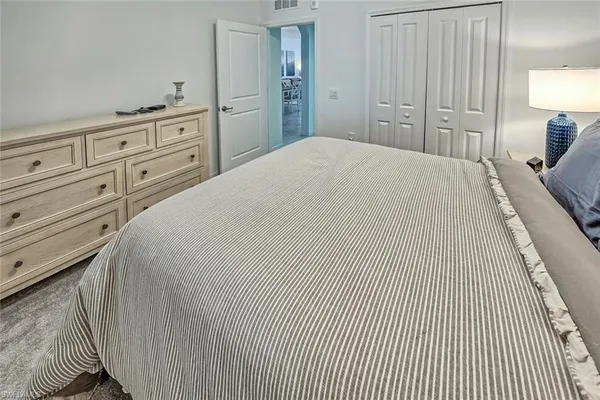 a bathroom with a sink toilet and a mirror
