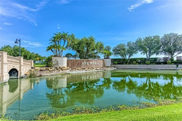 a view of a golf course with a lake