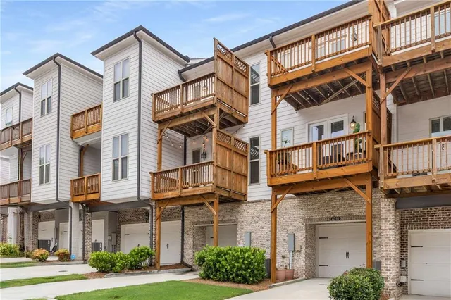 a front view of a building and a yard
