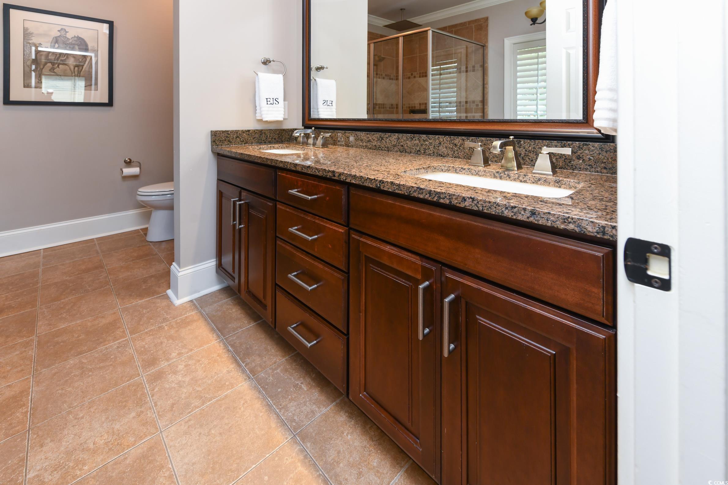 25 Orchard Avenue Murrells Inlet, SC 29576 - Photo 16 of 40 Bathroom featuring tile patterned floors, double s