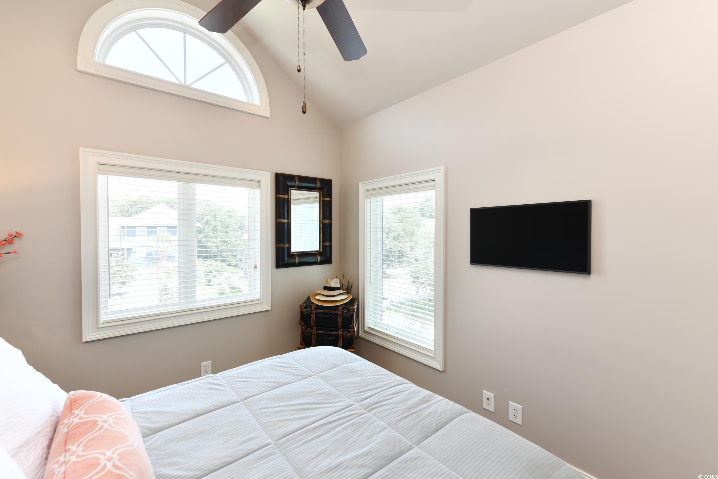25 Orchard Avenue Murrells Inlet, SC 29576 - Photo 25 of 40 Bedroom with ceiling fan and high vaulted ceiling