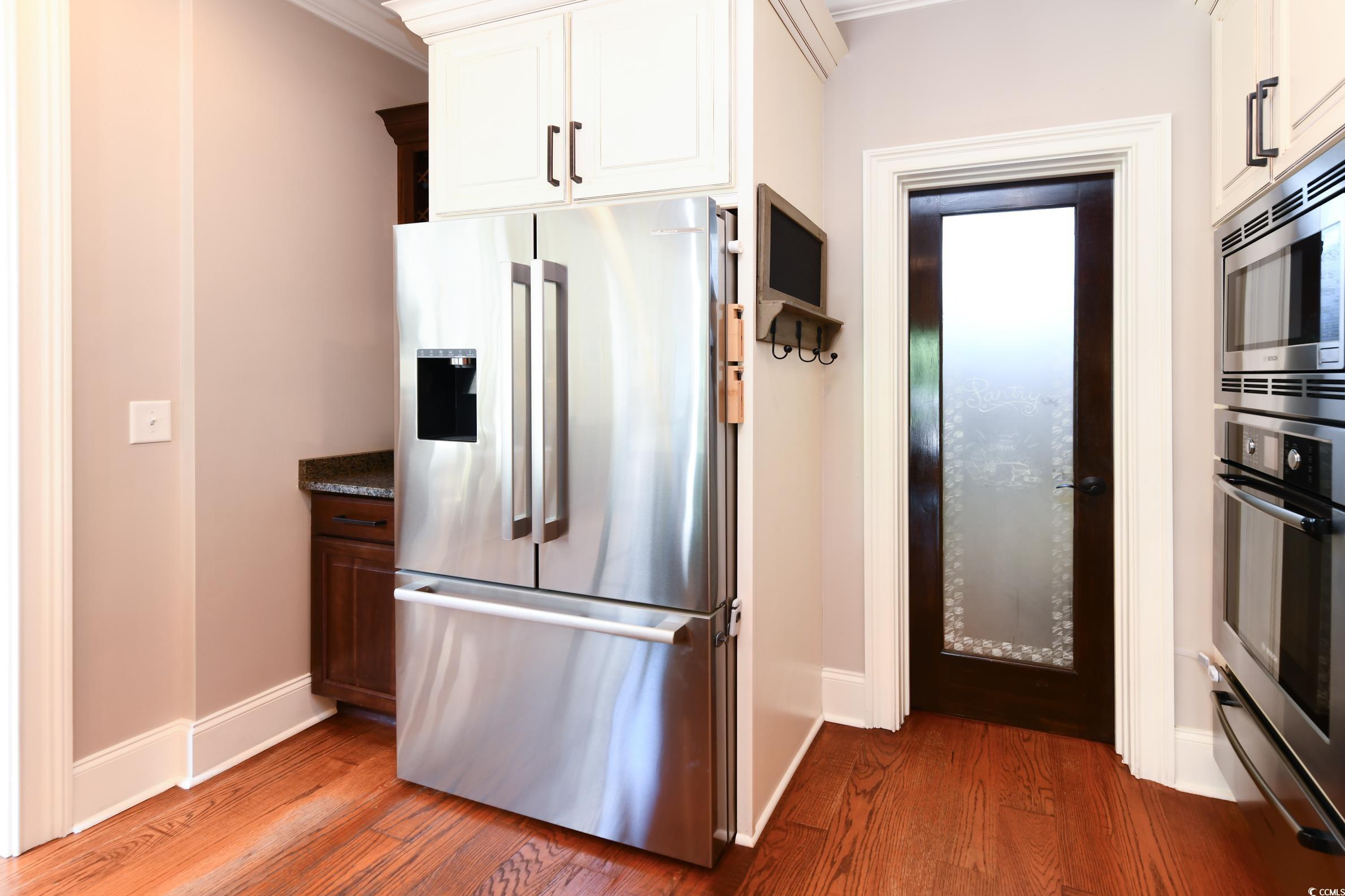 25 Orchard Avenue Murrells Inlet, SC 29576 - Photo 7 of 40 Kitchen featuring light hardwood / wood-style floo