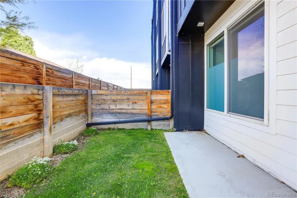 a view of a back yard of the house