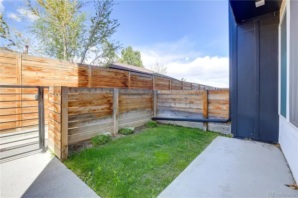 a view of a back yard of the house