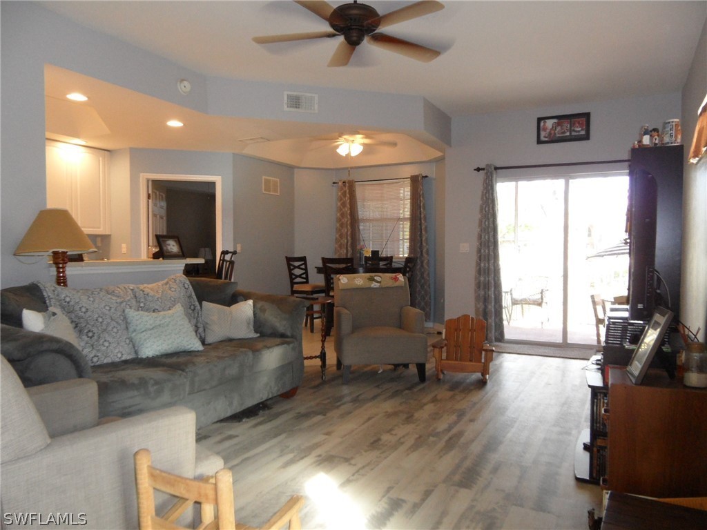 5430 Park Road, Unit 2 Fort Myers, FL 33908 - Photo 8 of 17 a living room with furniture and a flat screen tv