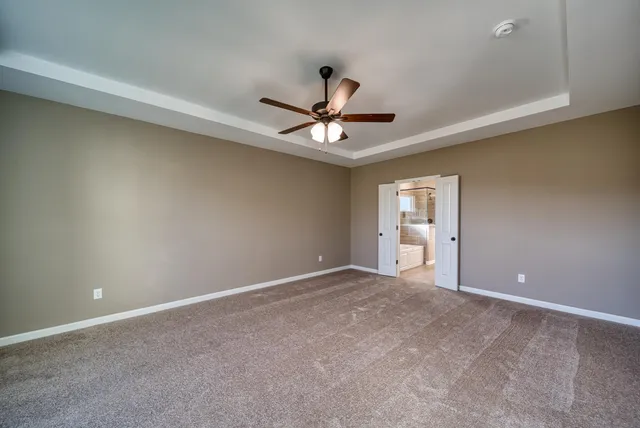 a bathroom with a sink a tub and a mirror