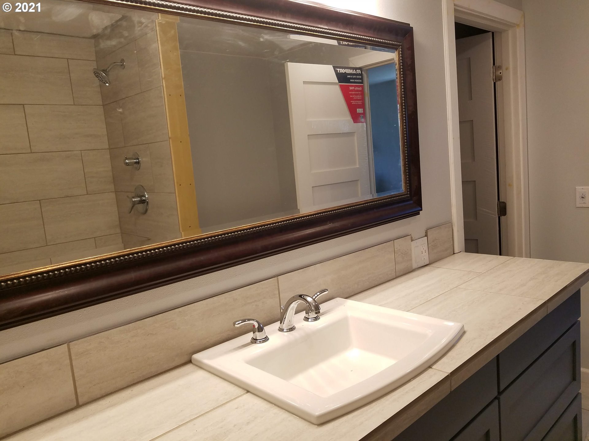 27225 Dave Road Canby, OR 97013 - Photo 13 of 31 a bathroom with a sink and a mirror