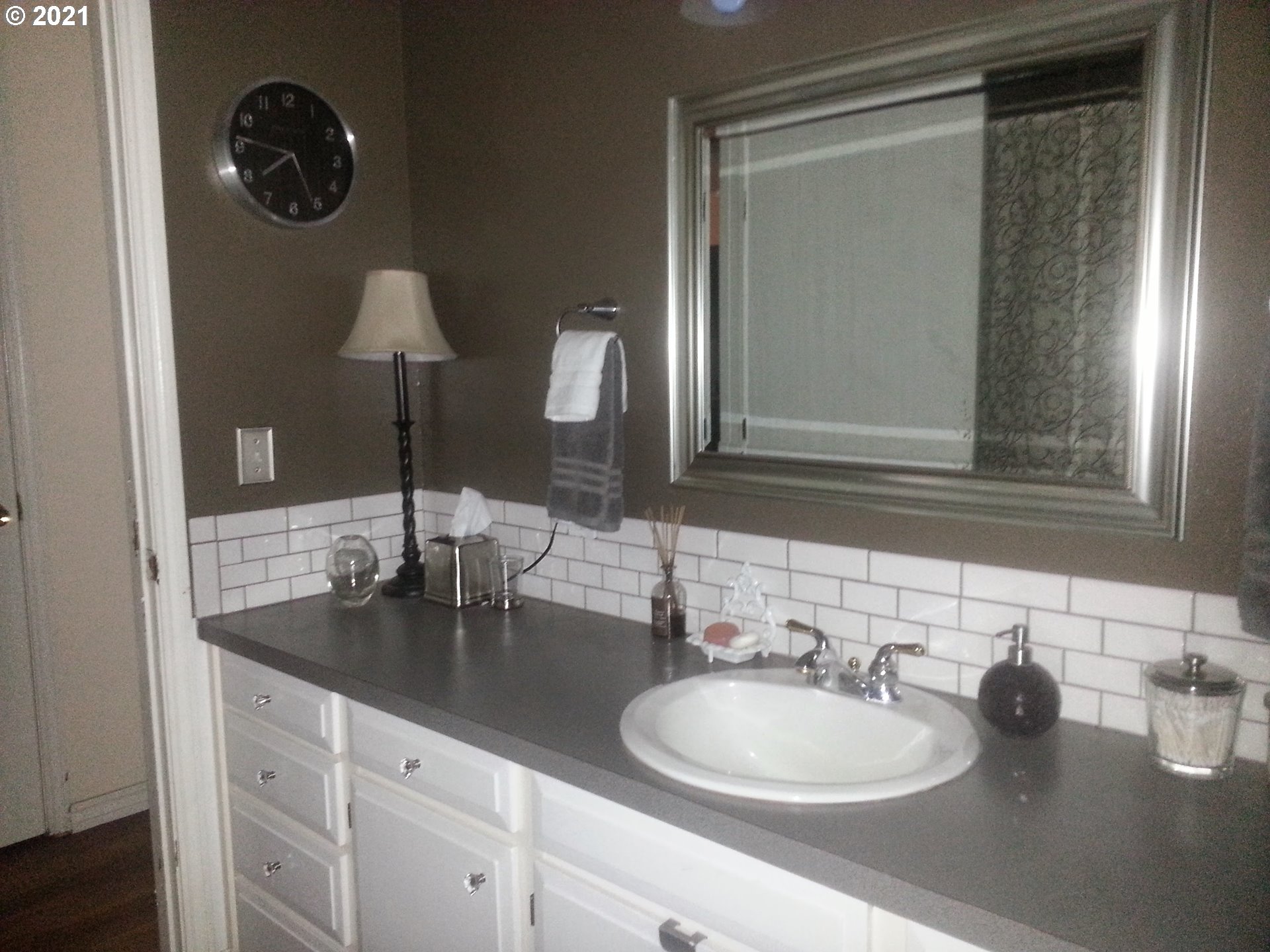 27225 Dave Road Canby, OR 97013 - Photo 18 of 31 a bathroom with a sink and a mirror
