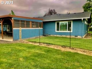 27225 Dave Road Canby, OR 97013 - Photo 5 of 31 a view of a house with a yard
