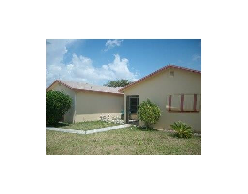 8879 Southwest 9th Street Boca Raton, FL 33433 - Photo 1 of 5 Exterior Front