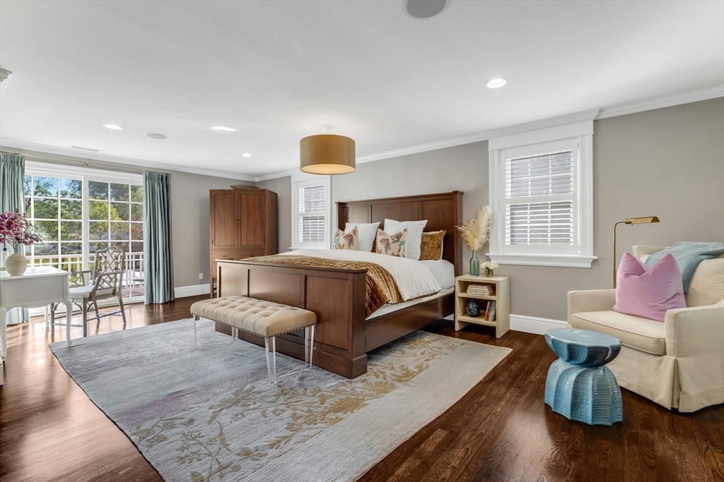 85 Old Farm Road Milton, MA 02186 - Photo 14 of 42 a bedroom with a bed wooden floor and lamp