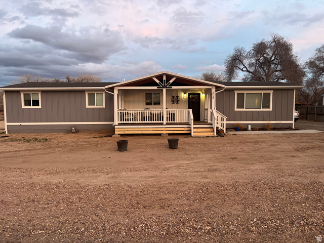 558 North N Cres Road Roosevelt, UT 84066 - Photo 1 of 31 Single-story residence featuring gray vertical siding with white trim