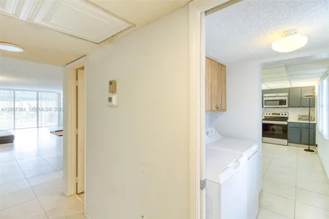 a utility room with washer and dryer