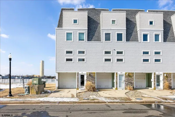 a view of a roof deck with patio