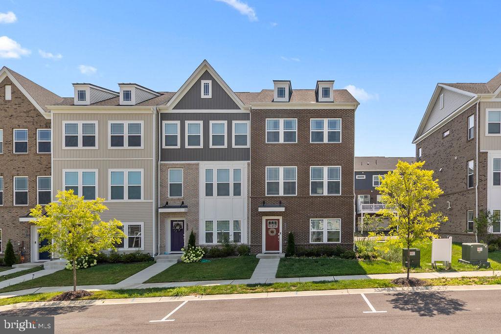 6882 Barrowfield Place Bryans Road, MD 20616 - Photo 1 of 34 a front view of a building