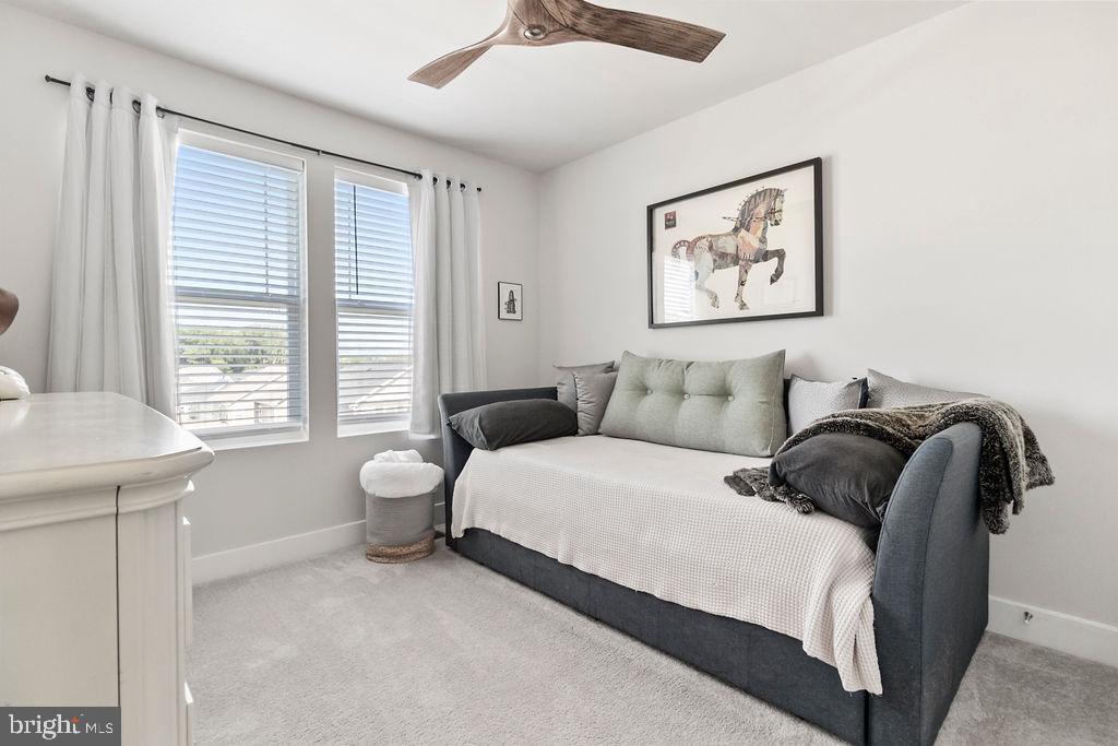 6882 Barrowfield Place Bryans Road, MD 20616 - Photo 17 of 34 a bedroom with a bed and a window