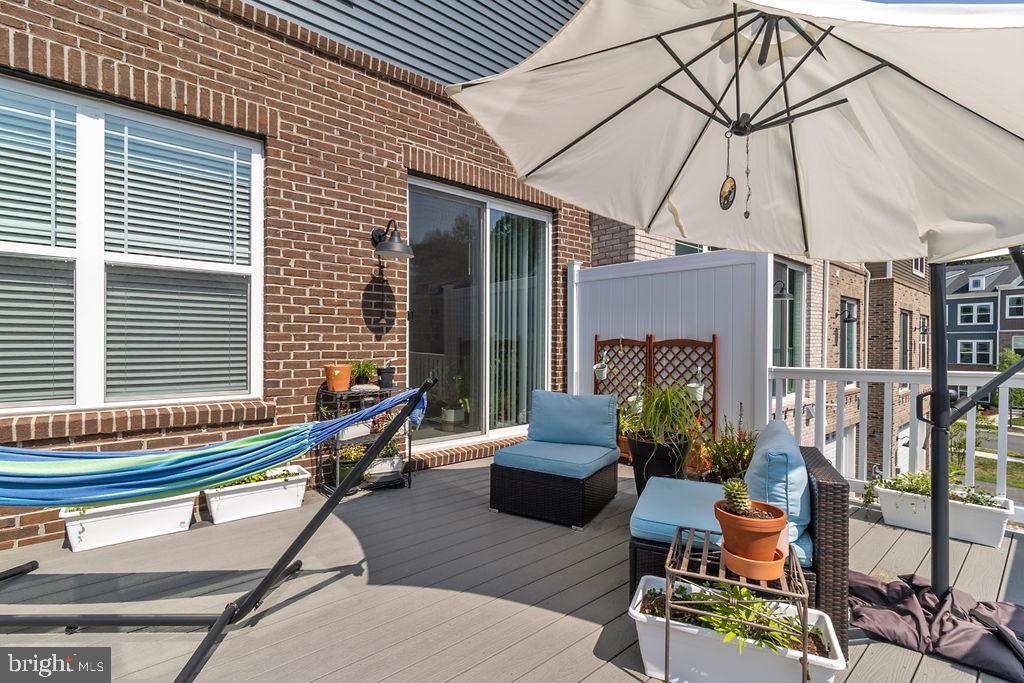 6882 Barrowfield Place Bryans Road, MD 20616 - Photo 28 of 34 a building outdoor space with patio furniture