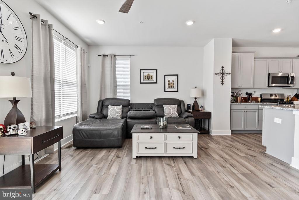 6882 Barrowfield Place Bryans Road, MD 20616 - Photo 30 of 34 a living room with furniture and a large window