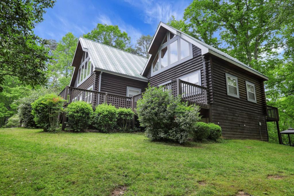 101 Yellow Bluff Road Dahlonega, GA 30533 - Photo 3 of 20 a backyard of a house with lots of green space