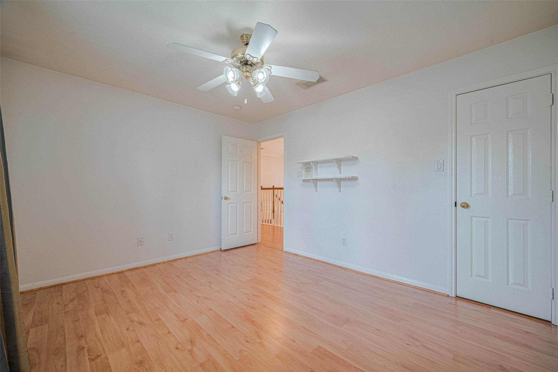 9218 Memorial Pines Way Spring, TX 77379 - Photo 31 of 39 Bedroom 2, every room has a fan.