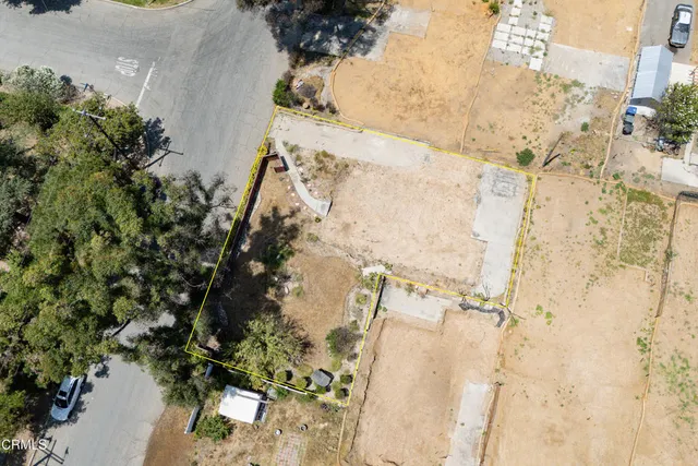 a view of a pathway both side of a road