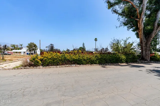 a view of swimming pool with a yard
