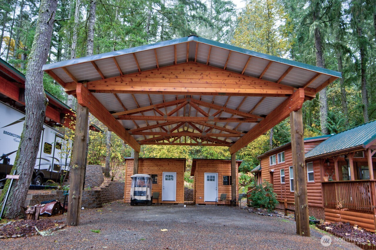 1546 Reservation Road Southeast, Unit 119 Olympia, WA 98513 - Photo 6 of 29 a view of a chairs and table in the backyard