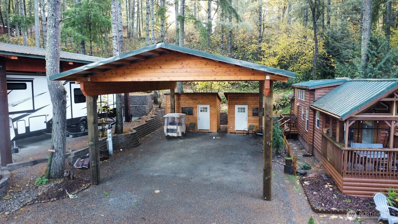 1546 Reservation Road Southeast, Unit 119 Olympia, WA 98513 - Photo 7 of 29 a view of a house with backyard