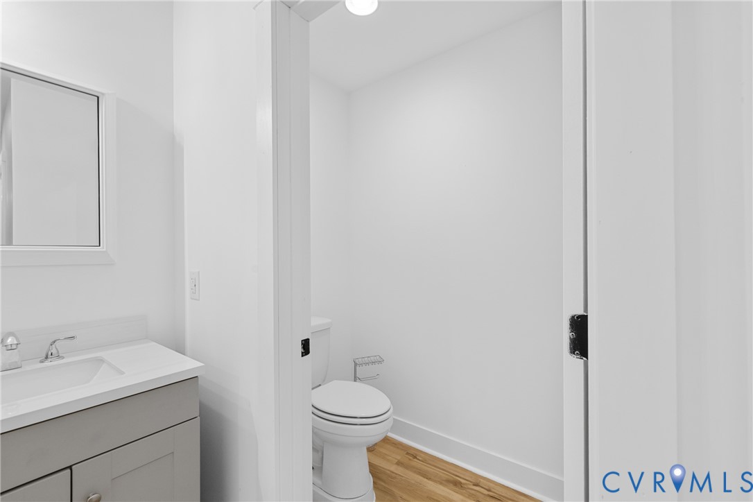 11905 Quaker Road Dinwiddie, VA 23841 - Photo 23 of 34 Vanity with a white countertop and rectangular sin