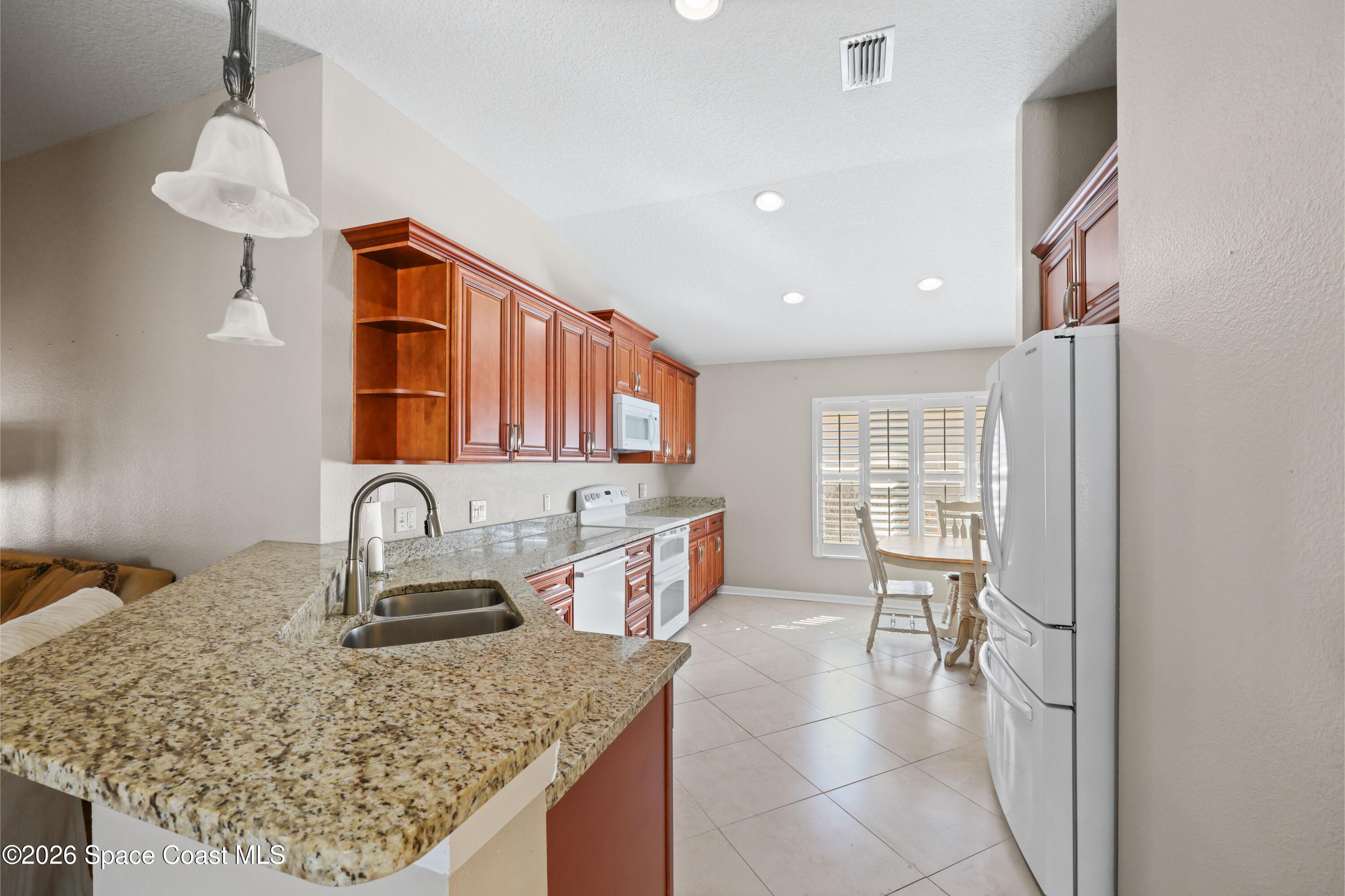 4720 Decatur Circle Melbourne, FL 32934 - Photo 6 of 25 Kitchen 1