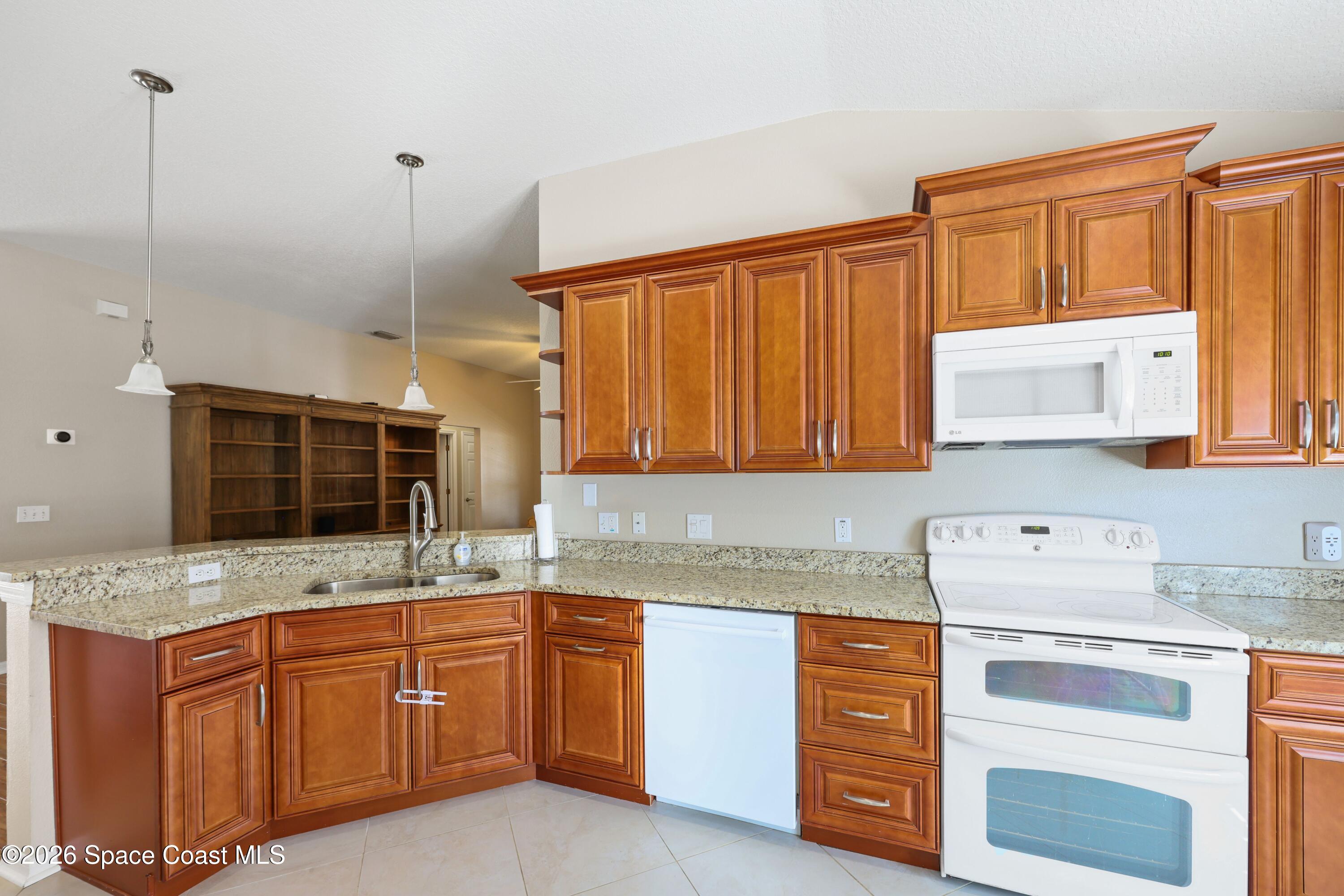 4720 Decatur Circle Melbourne, FL 32934 - Photo 7 of 25 Kitchen 2