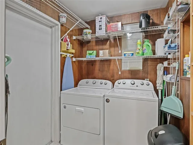 a view of a patio with couches chairs dining table and chairs