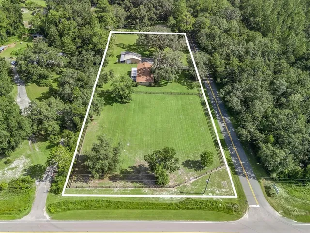 a house view with a garden space