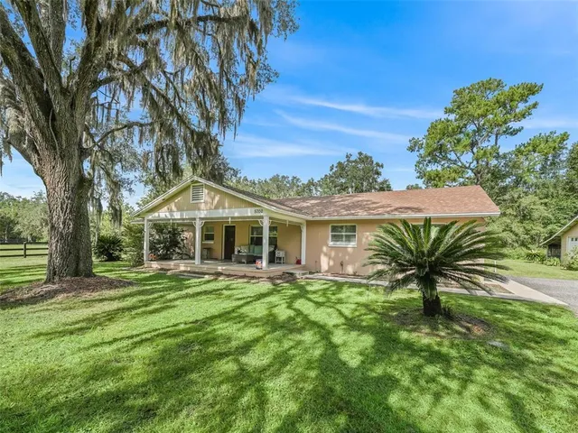 a kitchen with lots of counter space sink and appliances