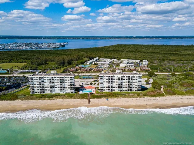 a view of a city with an ocean