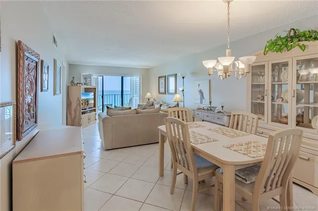 a kitchen with kitchen island cabinets and refrigerator