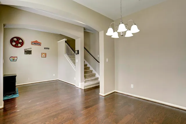 a view of a livingroom with wooden floor