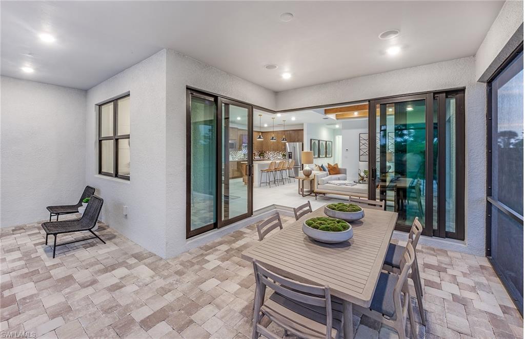 5637 Celebration Drive Immokalee, FL 34142 - Photo 20 of 35 a view of a dining room with furniture window and outside view