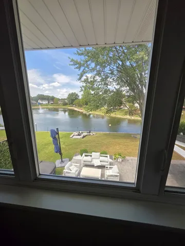 a view of a dining space with chairs in kitchen