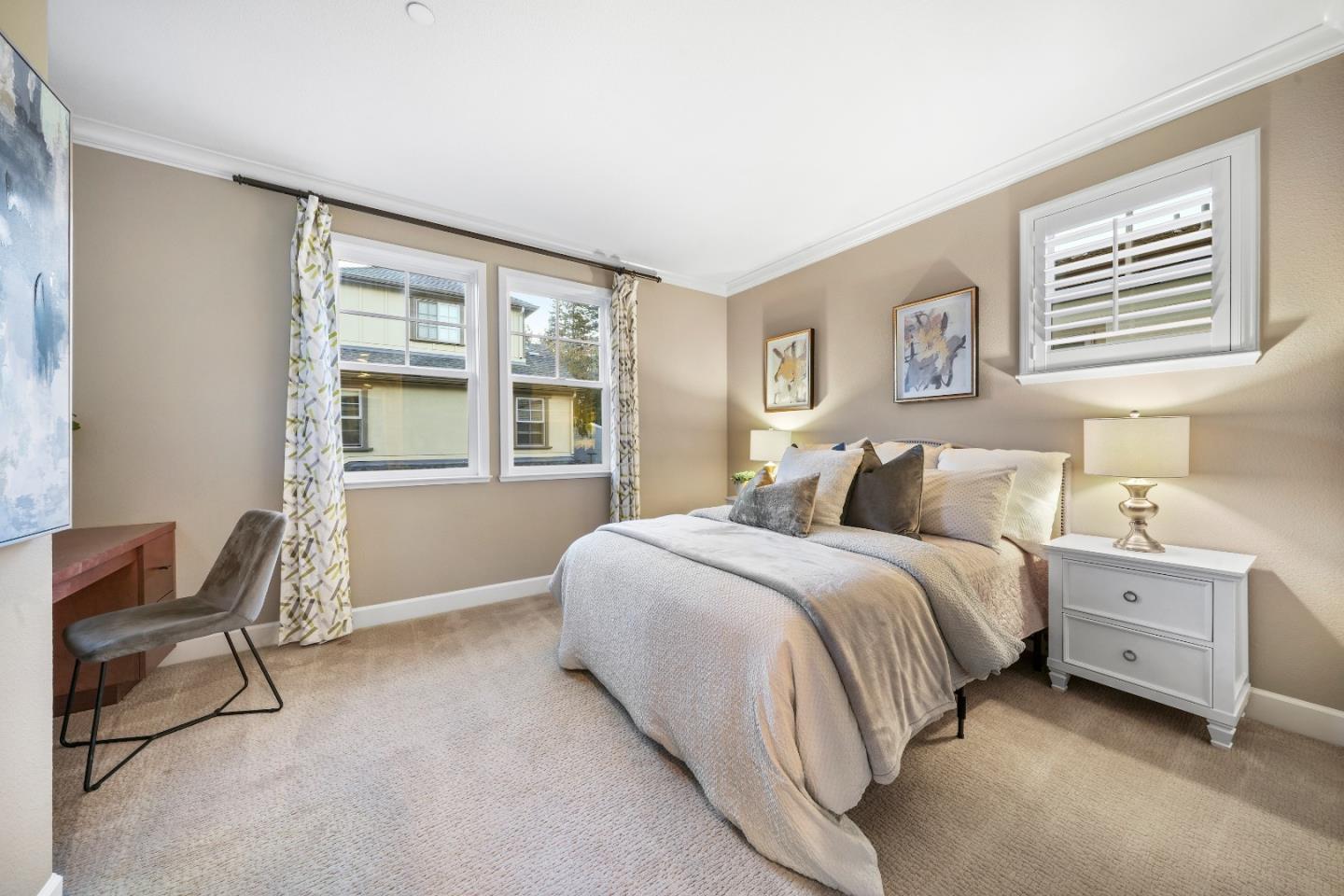 136 Avellino Way Mountain View, CA 94043 - Photo 15 of 40 a spacious bedroom with a bed and chair