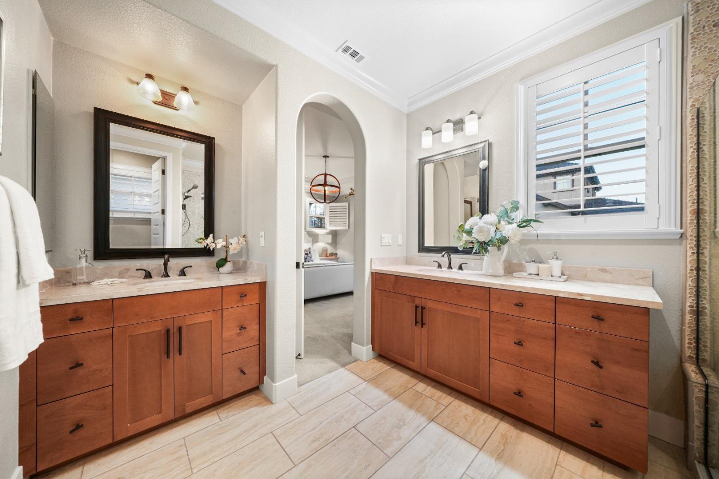 136 Avellino Way Mountain View, CA 94043 - Photo 21 of 40 a spacious bathroom with double vanity sinks a mirror and a bathtub