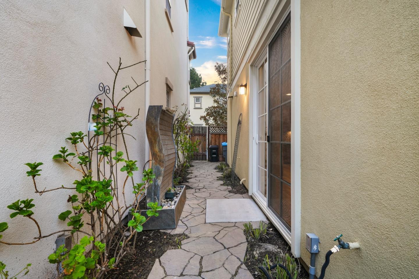 136 Avellino Way Mountain View, CA 94043 - Photo 30 of 40 a backyard with potted plants