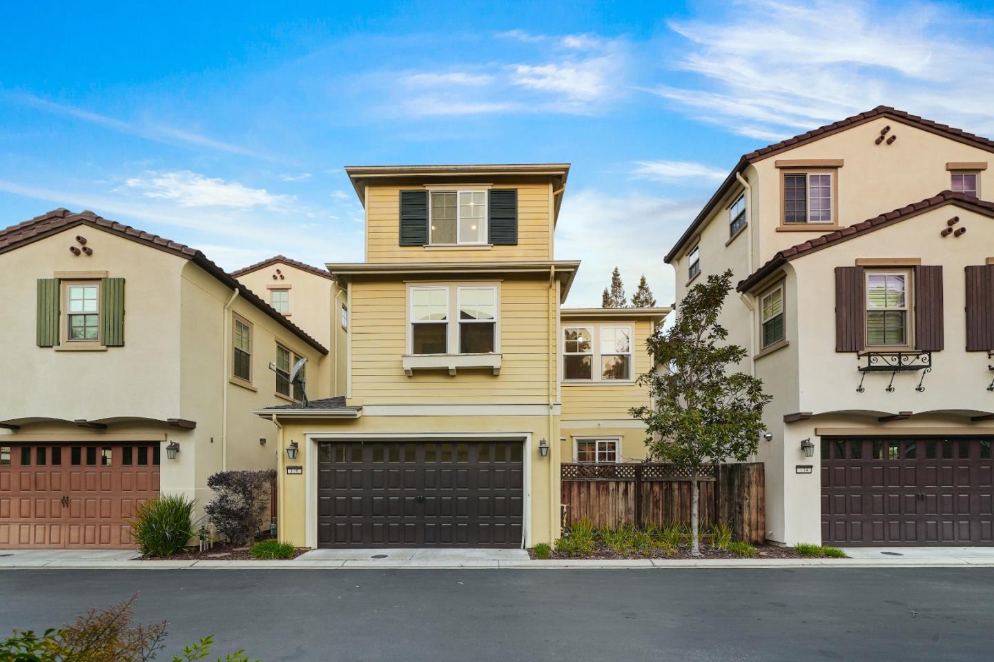 136 Avellino Way Mountain View, CA 94043 - Photo 31 of 40 a front view of a house with a garden
