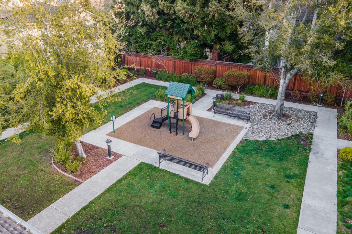 136 Avellino Way Mountain View, CA 94043 - Photo 34 of 40 a view of backyard with seating area and green space