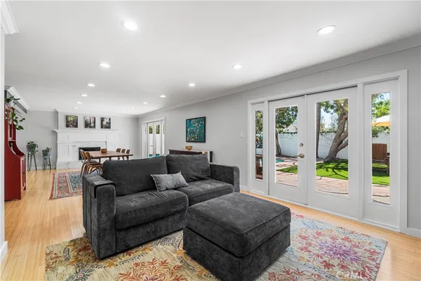 a living room with furniture and a rug