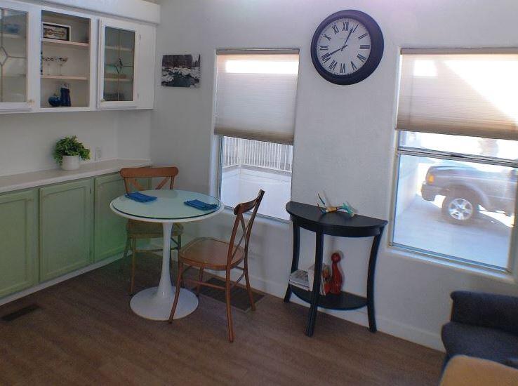 84136 Ave 44, Unit 602 Indio, CA 92203 - Photo 14 of 43 a view of a table and chairs in a room