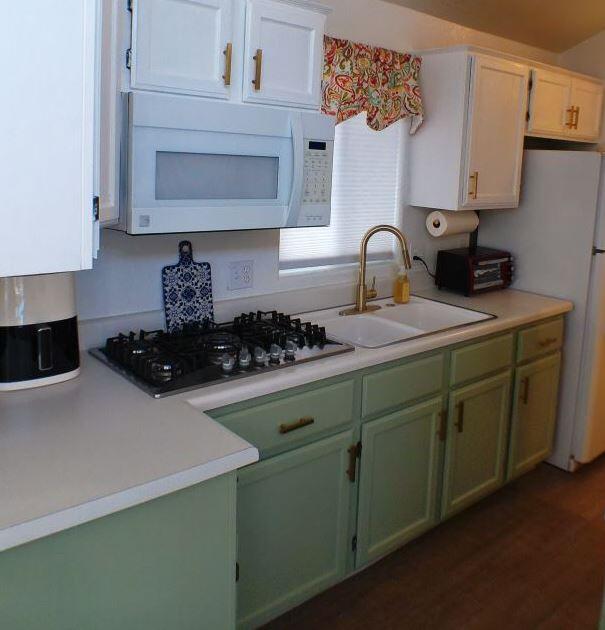 84136 Ave 44, Unit 602 Indio, CA 92203 - Photo 18 of 43 a kitchen with a sink and cabinets